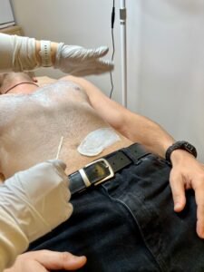 Male client receiving Brazilian wax in private studio – Men’s waxing in Bothell WA at LashLuv Beauty Bar