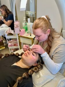 Client wearing freshly applied hybrid eyelash extensions for a soft, full look at LashLuv Beauty Bar in Bothell WA – serving Kenmore, Mill Creek, and Woodinville 