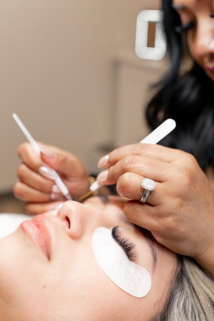 Lash technician working on lash fill extensions for a client at LashLuv Beauty Bar, Bothell WA – serving Woodinville, Lynnwood, and surrounding areas