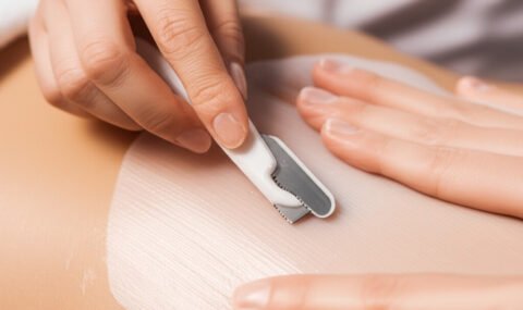 964aa1eb-0004-4dc4-bd3c-22fc5bd41e6b Client receiving a dermaplaning facial to remove peach fuzz and dead skin – LashLuv Beauty Bar in Bothell WA, serving Kenmore, Woodinville, and Mill Creek