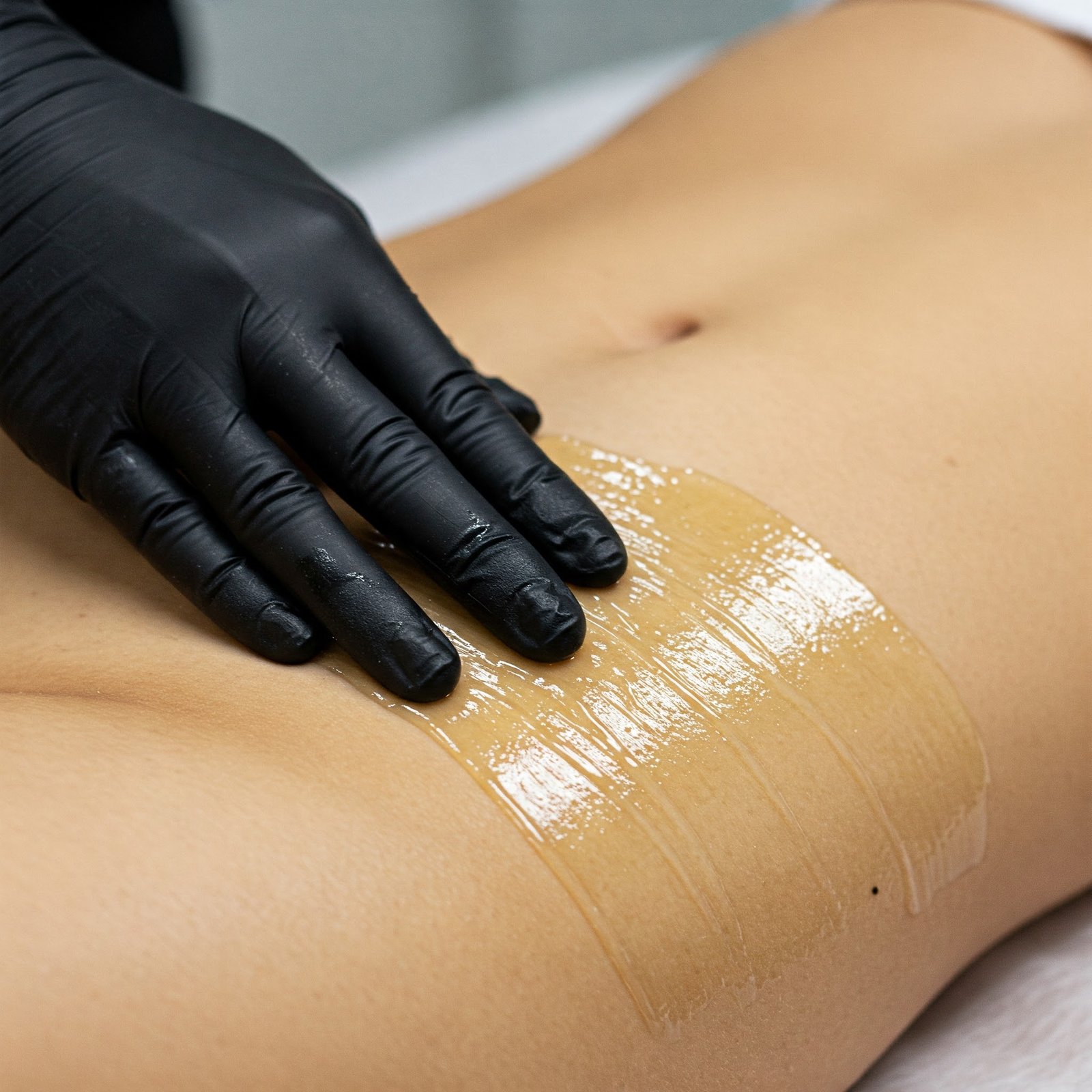 LL1 Client receiving a professional Brazilian wax in a private setting – LashLuv Beauty Bar in Bothell WA, serving Kenmore, Woodinville, and Mill Creek
