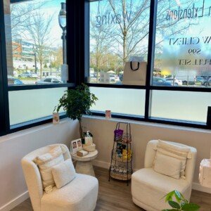 Cozy waiting area with two seats at LashLuv Beauty Bar in Bothell WA, welcoming clients from Mill Creek, Kenmore, and Woodinville before their beauty treatments