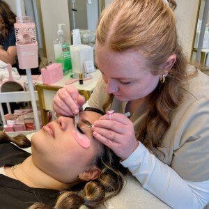 Licensed esthetician performing volume lash extension application – LashLuv Beauty Bar in Bothell WA, trusted by clients from surrounding cities like Woodinville and Kenmore