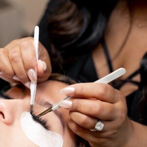 Esthetician applying classic eyelash extensions at LashLuv Beauty Bar in Bothell WA β enhancing natural lashes for clients from Mill Creek and Kenmore