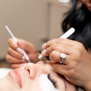 Lash technician working on lash fill extensions for a client at LashLuv Beauty Bar, Bothell WA – serving Woodinville, Lynnwood, and surrounding areas