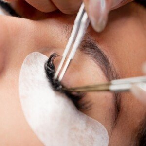 Close-up of esthetician applying volume lash extensions at LashLuv Beauty Bar in Bothell WA β trusted by clients from Kenmore and Kirkland